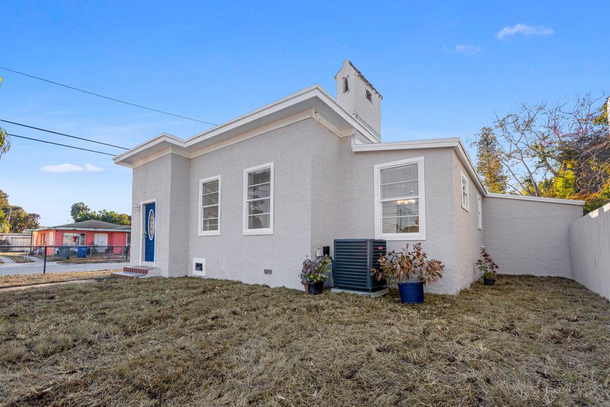 Beautifully remodeled historic home located in the heart of the Peacock Art District. NO HOA !!, This solid brick built residence has been thoughtfully updated while preserving its original character. Recent improvements include a new roof (2025), A/C(2025), updated electrical and plumbing(2025), and fully renovated kitchen and bathrooms (2025). Enjoy brand appliances (2025)with new gas range and on demand water heater (2025)for low power costs. Original hardwood floors have been refinished, and high ceilings create a bright, open living space. fully fenced with two double gates for multiple car parking.  Conveniently located just minutes from Downtown Fort Pierce and approximately 10 minutes to I-95.