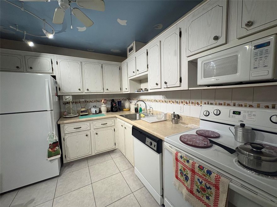 Welcome to this bright and inviting 2-bedroom, 2-bath residence offering generous living spaces and exceptional comfort. The condo features an open layout with large bedrooms, including a primary suite with a massive walk-in closet. Enjoy your morning coffee or evening breeze on the expansive screened balcony, perfect for relaxation or entertaining.Residents of Oak Brook enjoy resort-style amenities including a heated pool, tennis courts, fitness center, game room, clubhouse, and laundry facilities on every floor. Assigned parking adds convenience and peace of mind. This well-maintained community offers the perfect combination of comfort, value, and active adult living. Association requires a 35K income yearly, 675 credit score, and $3,500 maintenance escrow for a year.