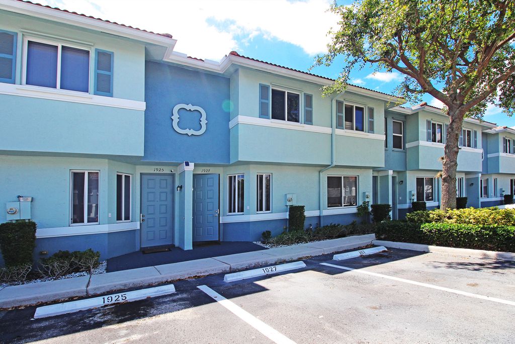 Photo of 1927 Hibiscus Lane, West Palm Beach, FL 33404 (MLS # R10972111)