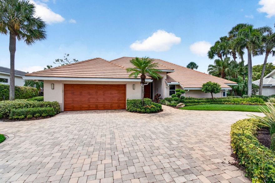 **Don't miss this rare opportunity** — your dream home awaits on a peaceful cul-de-sac in the prestigious boutique community of Delaire Country Club, where 324 custom homes surround a 27-hole championship golf course, you will find this beautifully updated one-story residence offering refined indoor-outdoor living for the most discerning buyer. This home is nestled on an oversized lot with a circular driveway, custom landscaping and sweeping golf course views.  Step inside and discover a sun-drenched interior where vaulted ceilings and floor-to-ceiling impact glass create a seamless connection between elegant indoor spaces and the lush outdoor paradise beyond.   The thoughtfully designed split floor plan features three generous bedrooms, each with its own en-suite bath, plus a custom oversized den/office with inspiring golf course views.  In the chef's kitchen style meets functionality. This kitchen is equipped with extensive counter and cabinet space, making it perfect for both everyday living and entertaining guests.   The primary suite is a sanctuary of tranquility and luxury offering breathtaking views of the pool and golf course with private access, allowing you to step into your personal oasis with ease. The suite features oversized dual walk-in closets and  spa-like bath is designed for relaxation and rejuvenation Step outside and discover your backyard retreat, a haven of relaxation and entertainment. The summer kitchen is perfect for al fresco dining and enjoying the beautiful Florida weather. A full-sized cabana bath adds convenience and luxury to your outdoor experience. The stunning views of the golf course provide a picturesque backdrop, making this space ideal for unwinding and socializing with friends.  For a comprehensive list of all the incredible upgrades that enhance this home, please refer to the attached feature sheet. This residence embodies the epitome of indoor/outdoor sunny Florida living, offering a lifestyle of unparalleled comfort and elegance.