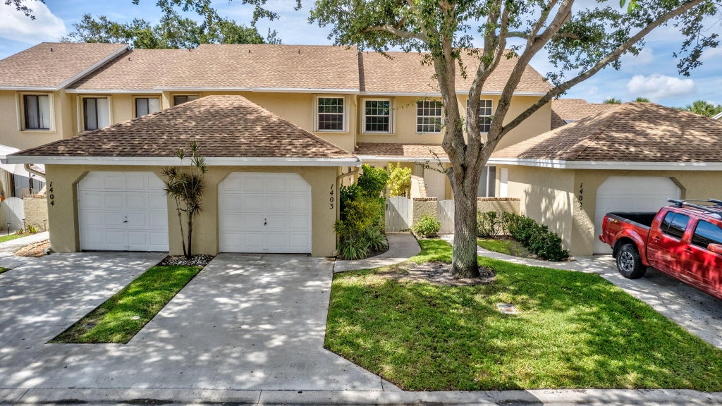 Photo of 1403 Maplewood Drive, Greenacres, FL 33415 (MLS # R11000316)