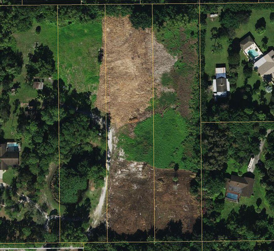 Build your dream home or private family compound on this 6-acre cleared parcel with pond located in a private and secluded neighborhood (no mandatory HOA), offering the perfect location to enjoy privacy with a country feel yet in the middle of everything. This parcel is comprised of three 2-acre parcels; seller will consider subdividing. New build will require well and septic install.
