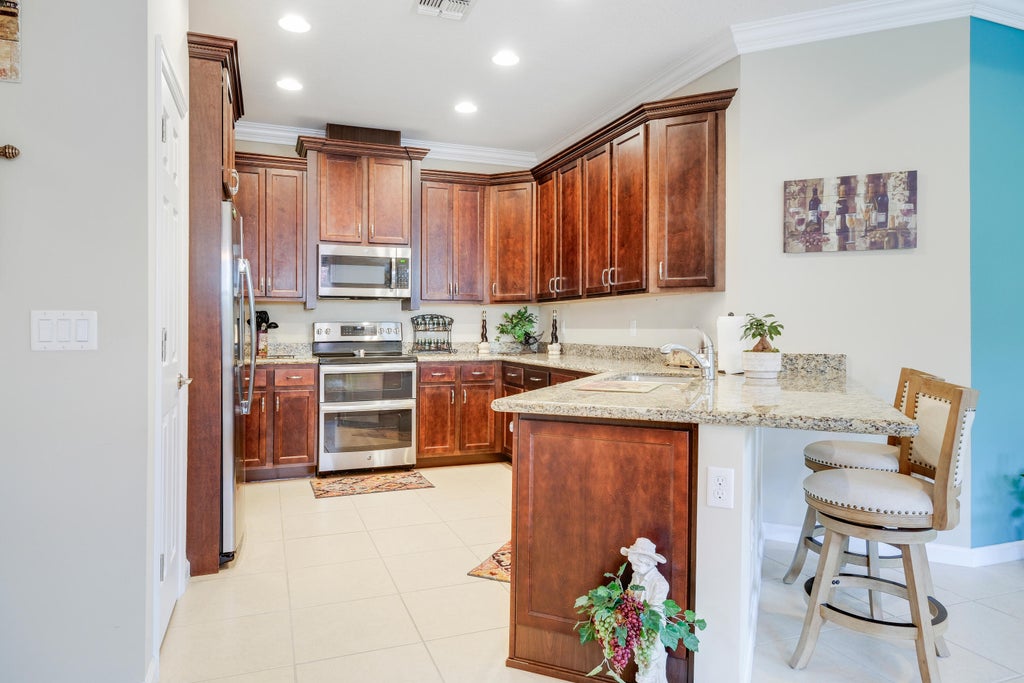 Photo of 11044 Winding Lakes Circle, Port Saint Lucie, FL 34987 (MLS # R11021223)