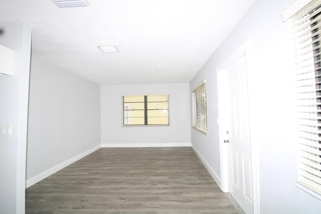 Photo of 1472 W 32nd Street, Riviera Beach, FL 33404 (MLS # R10996519)