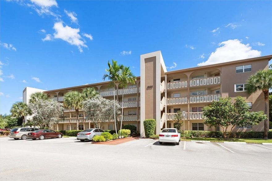 BACK ON MARKET! BUYER NOT APPROVED BY ASSOCIATION!  WOW! GREAT PRICE FOR THIS DESIRED EVERGREEN MODEL/CORNER UNIT IN EXPECEPTIONAL LOCATION ON WYNMOOR CIRCLE NEXT TO THEATER, MAIN POOL, GYM. A/C, WASHER/DRYER, WATER HEATER & REFRIGERATOR LESS THAN 1 YEAR YOUNG! THE FEEL OF A VILLA WITH THE CONVENIENCE OF A CONDO.  Beautifully tiled through out all living areas.  Desired Wynmoor offers all the amenities and activities you've been looking for!  Manned  community with Clubhouse, Theater, Cafe, Pickleball, Courtesy Bus, Clubs, Activities and more! Don't miss this opportunity!
