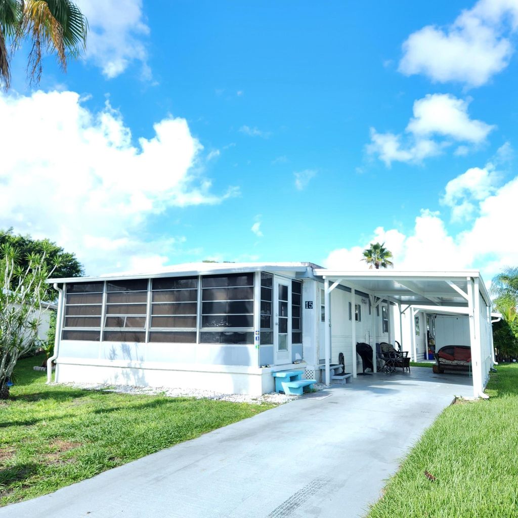 Photo of 15 Indigo Lane, Port Saint Lucie, FL 34952 (MLS # R11125501)