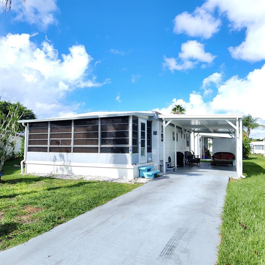 Charming 2 bedroom/1.5 bathroom on a cul-de-sac. Furnished home with a large Florida room perfect for a home office, 2nd living room, pet or plant room!! AC is 2022 and roof was sealed/coated in 2022. Living room & guest bedroom flooring replaced.  Most notable is this home is nestled in a peacefully quiet, yet active, 55+ community. You will be pleased w/ this prime location; close to the beach, mall, grocery stores, shopping, post office, banks, pharmacies, hospitals & more. Lot lease of only 842.53 includes security, cafe, Clubhouse w/activities, lawn care, trash, free private golf course, bingo, heated pool, pickleball, tennis, workshop, shuffleboard, bocce, gym, library, cards, Mahjong, clubs & more! Grab your slice of paradise in the highly desired town of Port St Lucie!