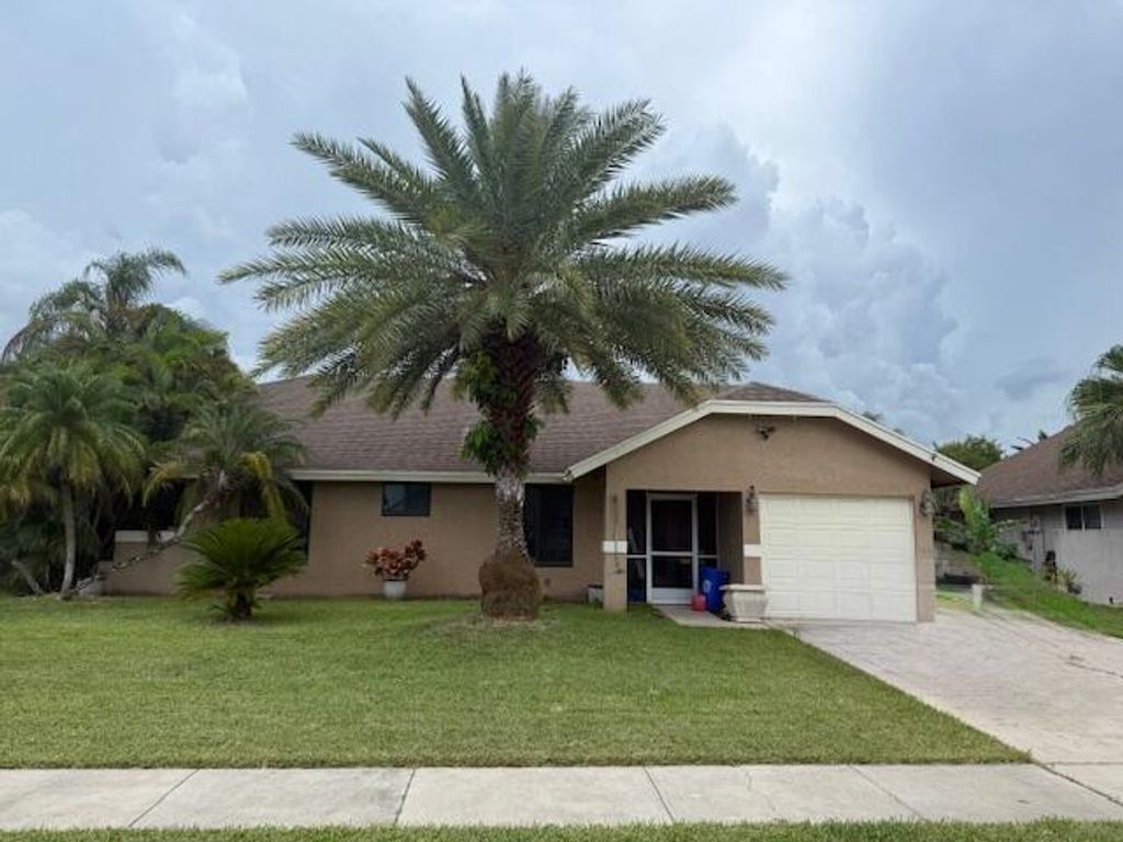 Photo of 22469 Swordfish Drive, Boca Raton, FL 33428 (MLS # R11117337)