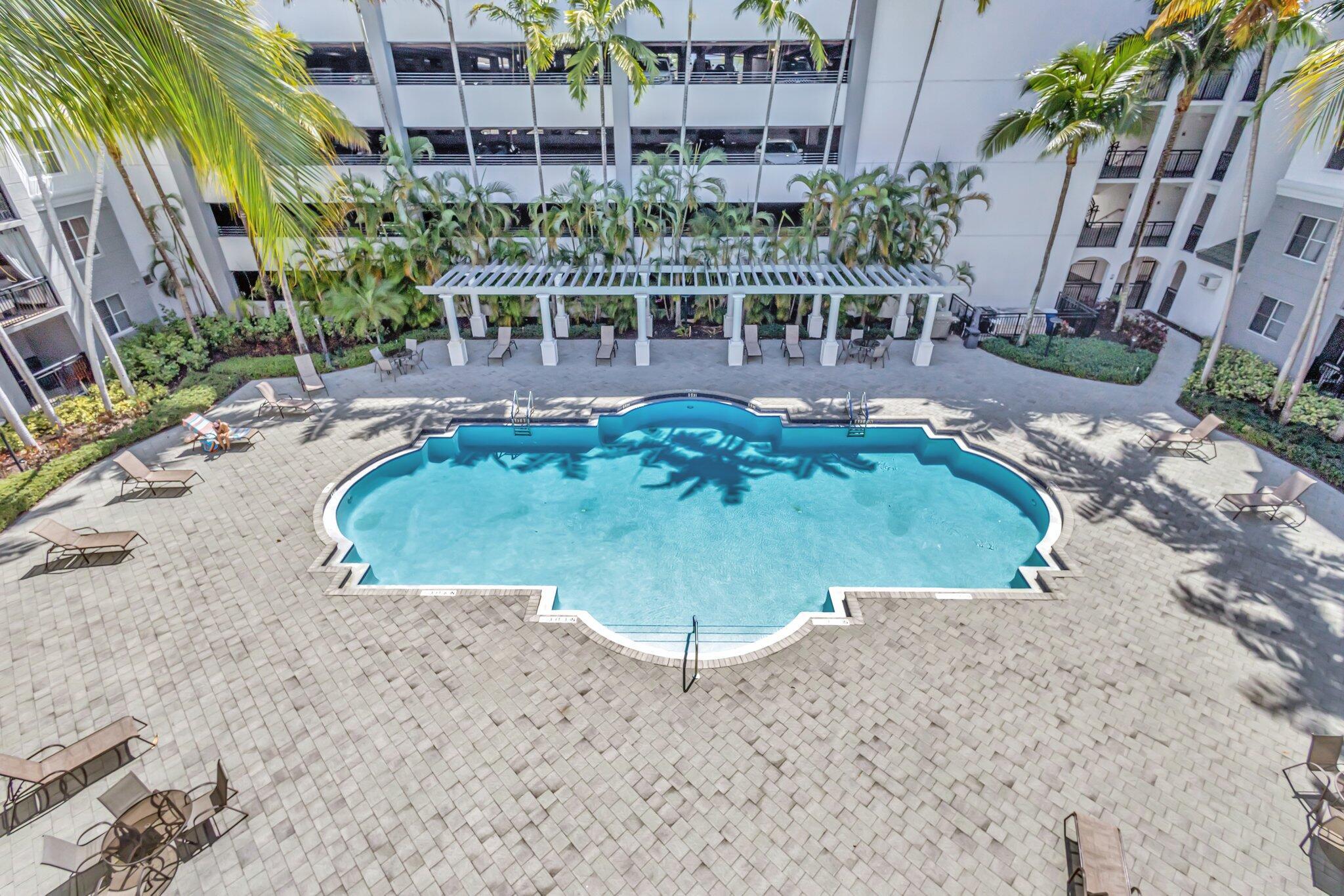 WHAT A LOCATION! Walk to the restaurants and shopping, SERVICES included: water, sewer. cable, WIF you pay electricity, modern building with IMPACT windows , 3 pools, Gym and much more3 LARGE bedroom and large double size balcony