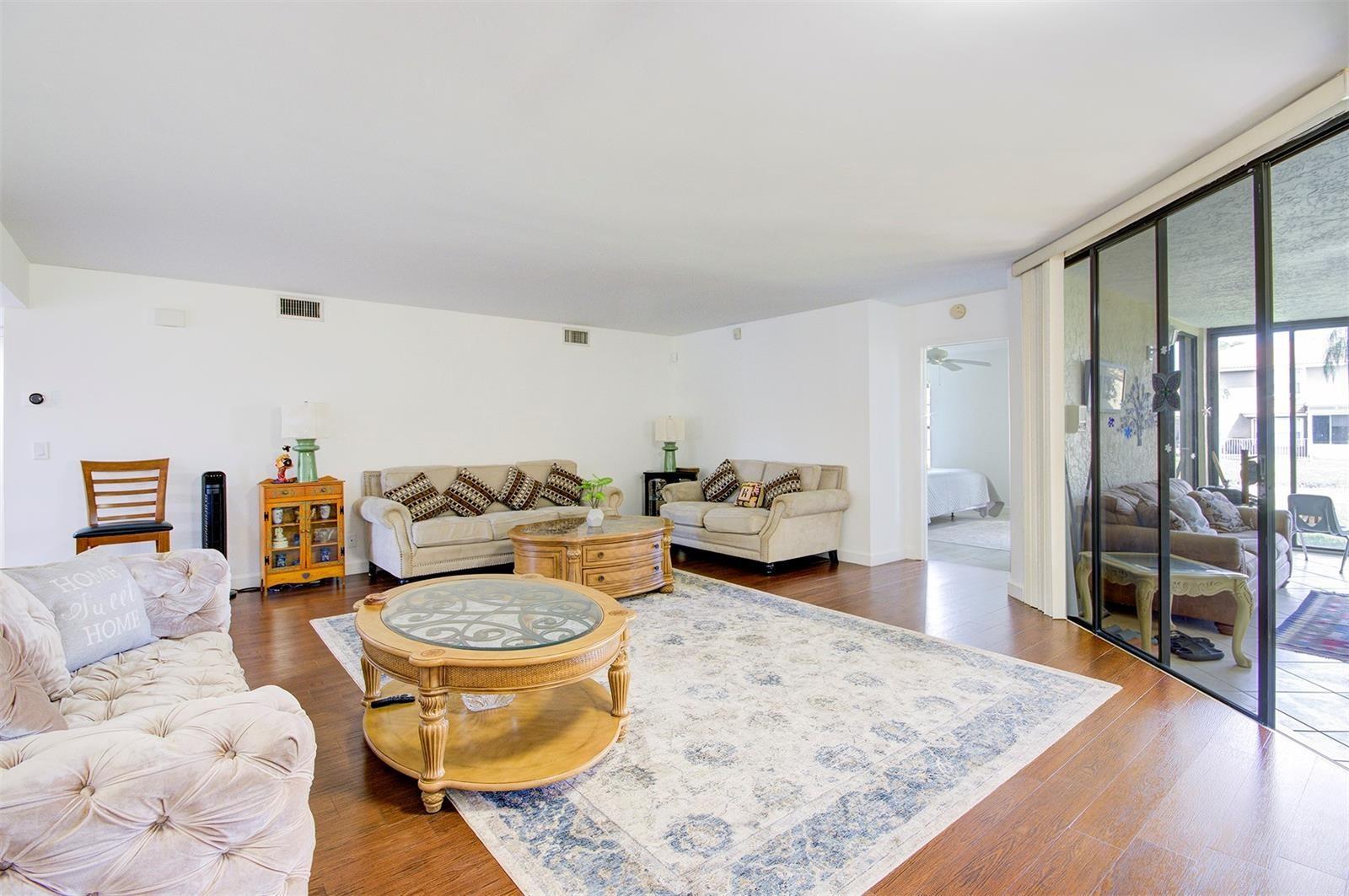 Beautiful updated 2Bed/ 2Bath condo with oversize sun room in Sweetwater of Boca Chase. This is at 1st floor and the condo has very nice tiled flooring, new washer/ dryer , huge pantry and closet space, both bathrooms have new vanities as well as shower and tub. patio overlooks back area with canal. Whole apartment was just freshly painted.