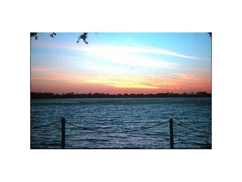 CLEAN ELEGANT 24 HR GATED COMMUNITY WITH UNBEATABLE AMENITIES INC. 3 HEATED POOLS AND SPAS, TENNIS CTS., FITNESS CENTER AND A BEAUTIFUL CLUBHOUSE. WALKING PATH SURROUNDING A 168 ACRE FISHING AND BOATING LAKE. PET FRIENDLLY, A TRUE MUST SEE. 2/2 IS FRE SHLY PAINTED. 1ST FLOOR LOCATION GREAT FOR PETS OR HANDICAPPED. STUNNING LAKE VIEWS FROM YOUR LIVING ROOM AND MB. NEWLY TILED SCREENED IN PATIO WITH ROLL DOWN HURRICANE SHUTTERS. ESTATE SALE WITH MOTIVATED SELLER. ANY REASONABLE OFFERS CONSIDERED.