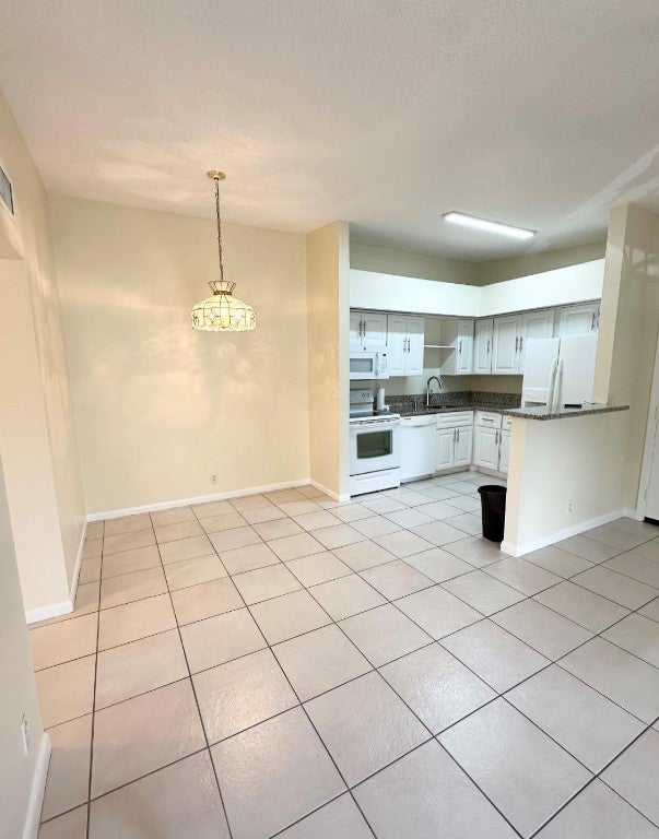 Photo of 15484 Lakes Of Delray Boulevard #201, Delray Beach, FL 33484 (MLS # F10518249)