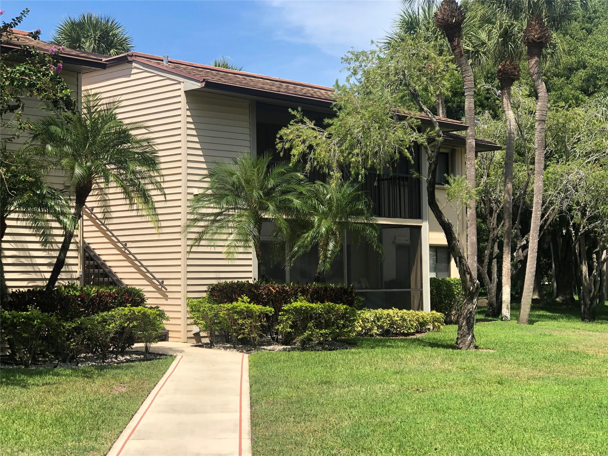 nice 2/2 in gated community, tile & wood flooring, beautifully updated, unit washer dryer in unit annual unfurnished.