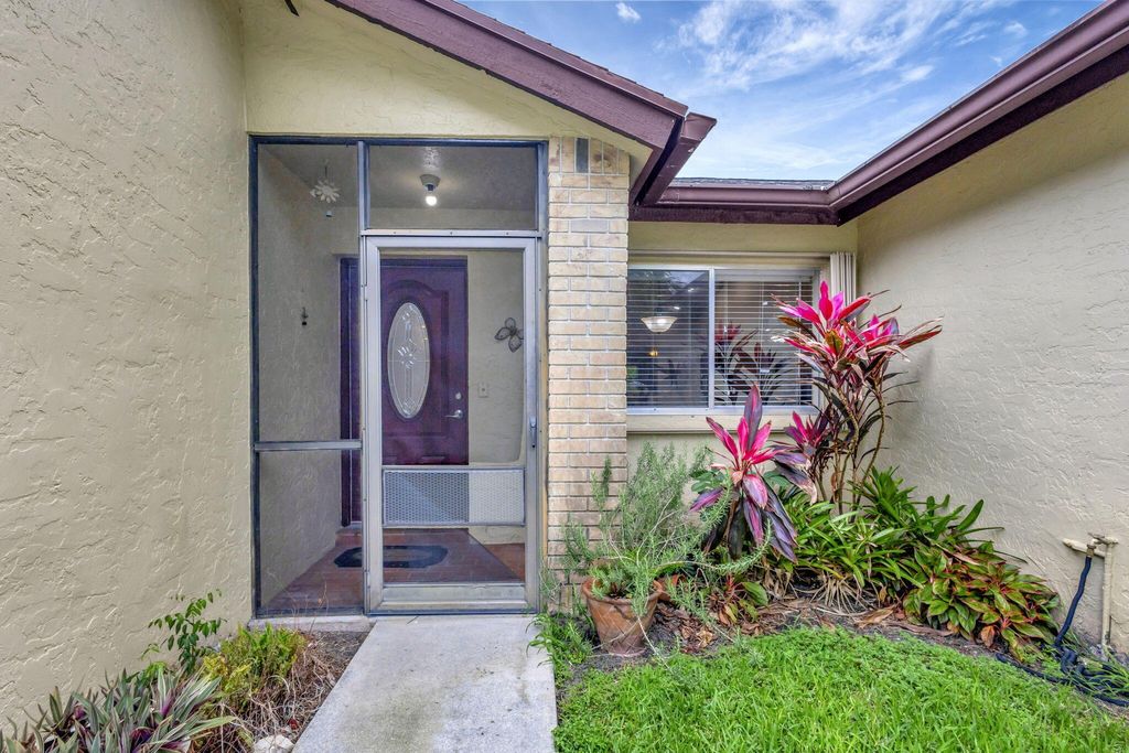 Photo of 178 Ramblewood Circle, Royal Palm Beach, FL 33411 (MLS # B26013659)