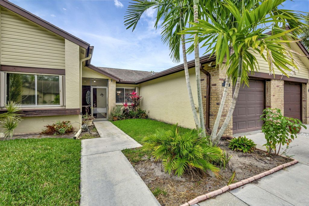 Photo of 178 Ramblewood Circle, Royal Palm Beach, FL 33411 (MLS # B26013659)