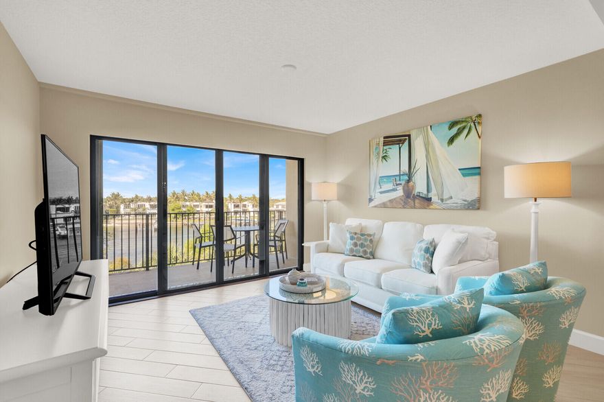 Welcome to coastal living at its finest at 1001 Seafarer Circle, Unit 405, in the heart of Jupiter. This fourth-floor condo offers sweeping water and marina views and is just steps from the Intracoastal Waterway. Completely renovated in 2018, the residence features a bright, open layout filled with natural light, an updated kitchen with stainless steel appliances, and a spacious living area perfect for relaxing or entertaining. Step out onto your private balcony and take in serene marina and waterfront views. The primary suite offers ample closet space and a beautifully updated ensuite bath. Additional highlights include a newer A/C (2023) for peace of mind. Located in the highly desirable Bluffs Marina community, residents enjoy a true boating lifestyle with a private marina, available  boat slips, and direct Intracoastal access with no fixed bridges—perfect for boaters. The community also offers resort-style amenities including pools, tennis courts, and scenic walking paths. Ideally situated just minutes from Jupiter's pristine beaches, waterfront dining, and shopping, and only 30 minutes from Palm Beach International Airport, this is South Florida living at its best.