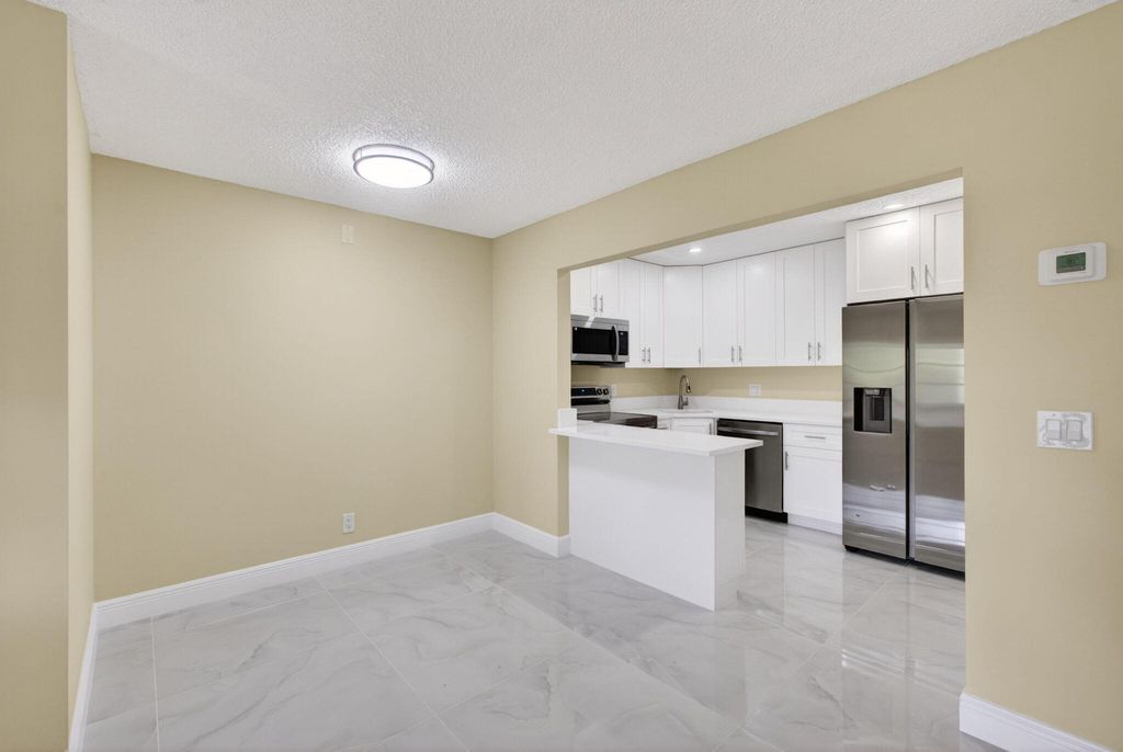 Photo of 4947 Sable Pine Circle #D2, West Palm Beach, FL 33417 (MLS # B26013626)