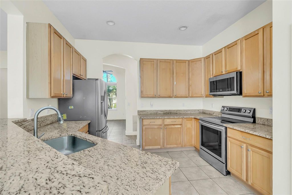 Photo of 1038 SW Fisherman Avenue, Port Saint Lucie, FL 34953 (MLS # F10531963)