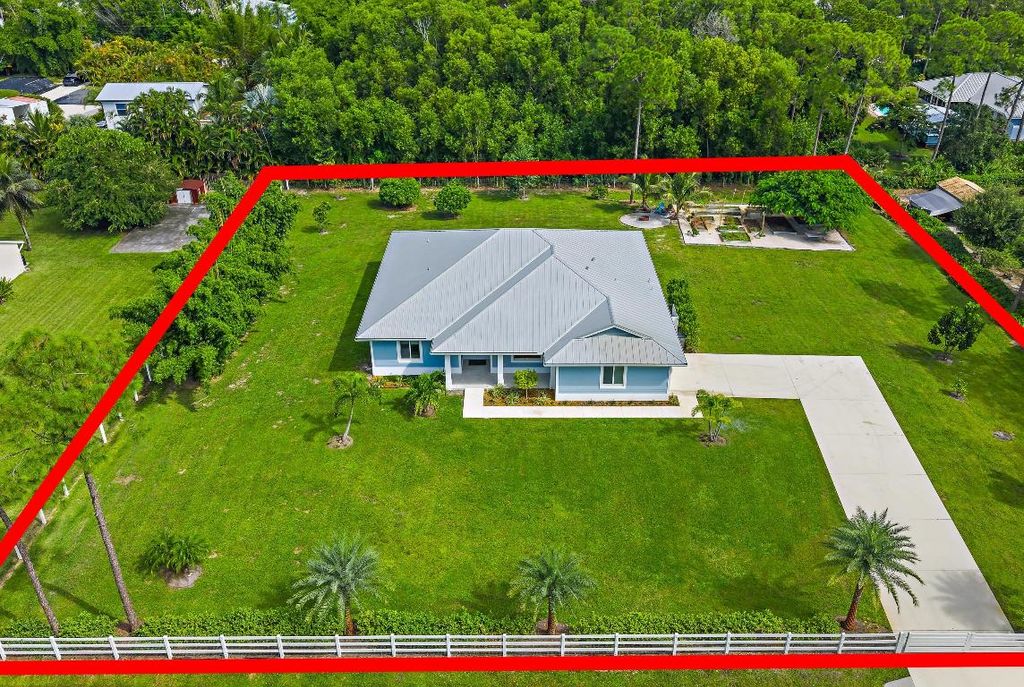 Photo of 13395 152nd Road N, Jupiter, FL 33478 (MLS # R11124970)