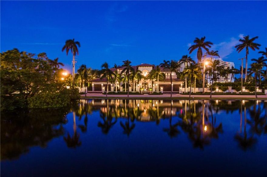 Location, location, Location.  This expansive 2.5 lot property in the prestigious Las Olas Isles neighborhood of Fort Lauderdale has it all.  Featuring 11,000 square feet with 4 bedrooms, 2 offices, 6 full baths, and 3 half-baths.  This estate offers the enviable luxury of privacy with no immediate neighbors, and amenities which include over 270’ of waterfront with 2 docks, a 25,000 LB boatlift, and tennis court.  This meticulously maintained home is ideal for entertaining on a grand scale.   Features include an elegant home theater, large summer kitchen, wine cellar, Crestron whole house automation system, elevator, 5 car garage, impact windows and doors, generator, state-of-the-art security cameras, and impeccable landscaping.