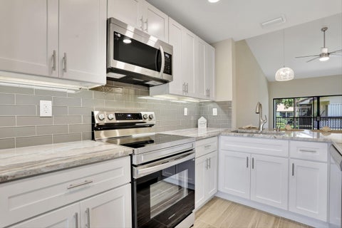 Tiny photo for 1945 SW 15th Street #68, Deerfield Beach, FL 33442 (MLS # B26017308)