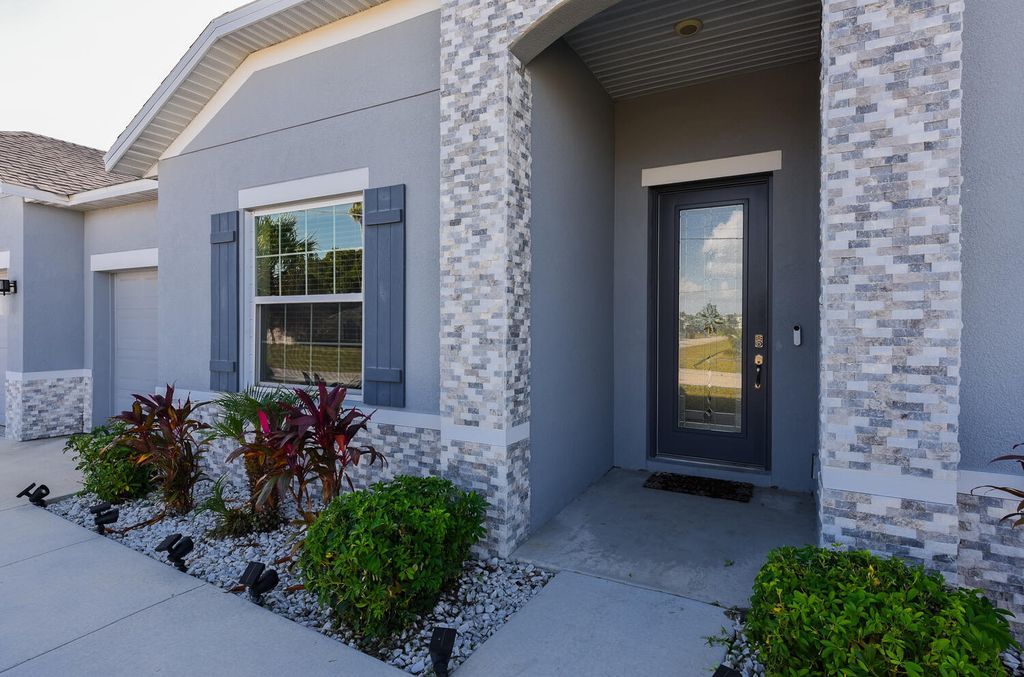 Photo of 643 SW Millard Drive, Port Saint Lucie, FL 34953 (MLS # R11144053)