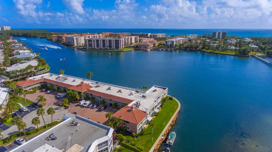 DIRECT INTRACOASTAL!  Unobstructed wide water views in the highly desired Intracoastal Terrace community. Spacious open floor plan, 2 bedroom 2 bath.  This condominium complex, with a community dock and waterfront pool, encompasses the entire end of the peninsula fronting the Intracoastal and John B Rutherford park. Convenient location by land and sea.  Walk to the Fifth Ave Shops and more.  Only about 1.5 miles to Mizner Plaza and 2 miles to the Boca Inlet.  Hurricane windows and electric roll down shutters.  New roof, newer sea wall. Come make this home your own!