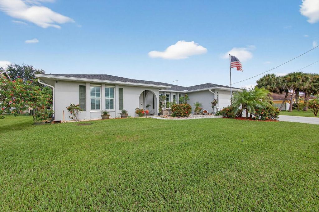 Photo of 2477 SW Chestnut Lane, Port Saint Lucie, FL 34953 (MLS # R11156843)