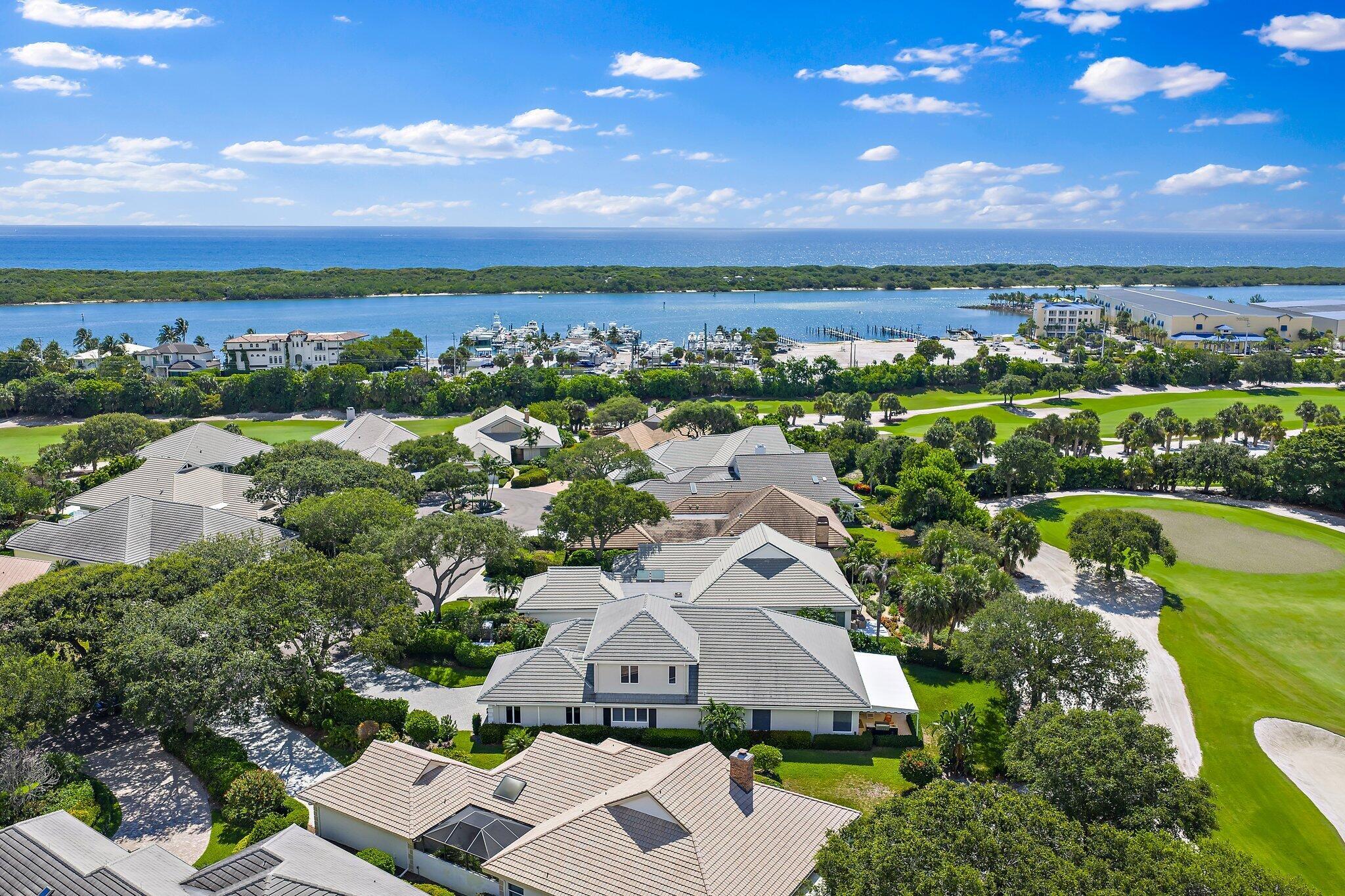 Elevated Luxury in the Heart of Jupiter HillsWelcome to one of the most sought-after addresses in South Floridaa''an exquisite residence tucked within the prestigious, guard-gated community of Jupiter Hills. Perfectly positioned on one of the neighborhood's highest elevations, this expanded Prestwick model offers sweeping views of the 15th fairway, blending timeless elegance with the serene backdrop of one of Florida's premier private golf courses.Designed for the discerning buyer, this turnkey home showcases exceptional craftsmanship and thoughtful details throughout. Rich hardwood flooring, custom cabinetry, plantation shutters, and bespoke woodwork lend warmth and character to every space. Carefully selected finishes, sophisticated lighting, and (see more)