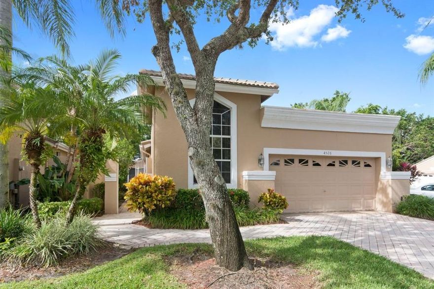 This Lovely Villa Is Located Located In Cambridge - Wycliffe Golf & Country. New Roof 2016 and New A/C 2018. This Arlington Model Is The Largest Floor Plan Offered In The Villa's Featuring; Open Kitchen Redone With Wood Cabinets, Granite, Stainless Steel Appliances And Two Skylights. Master Bedroom With Laminate Flooring. Master Bath Upgraded With Frameless Glass Shower Door & Skylight. Guest Bedroom With Laminate Floor. Very Private Screened Patio With Awning/Lake/Golf Views. Don't Miss Out, Make Your Appointment Today! Wycliffe Golf & Country Club Is A Mandatory Membership Club Offering The Best Lifestyle In South Florida. Featuring 2 Dining Venues, State Of The Art Fitness Center, Palates, Aerobics, Yoga, Spin, Fitness Classes, Water Aerobics, Personal Trainers, Physical Therapy, Sauna, Steam, 16 Har-Tru Tennis Courts With A Center Court Stadium Seating, Two Championship Golf Courses, Olympic Size Swimming Pool/Spa, Full Service Spa, Ladies/Men's Card Rooms, Clubs And Organizations, Special Events, Dinner Dances.  Come Join The Fun, Make Your Appointment To See This Wonderful Home And Country Club Today!