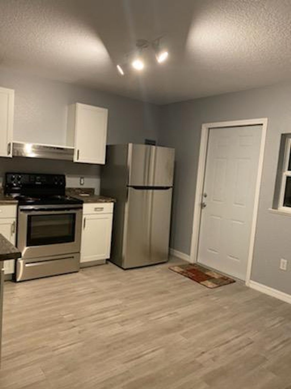 Photo of 1622 SW Crawford Avenue, Port Saint Lucie, FL 34953 (MLS # R10966253)