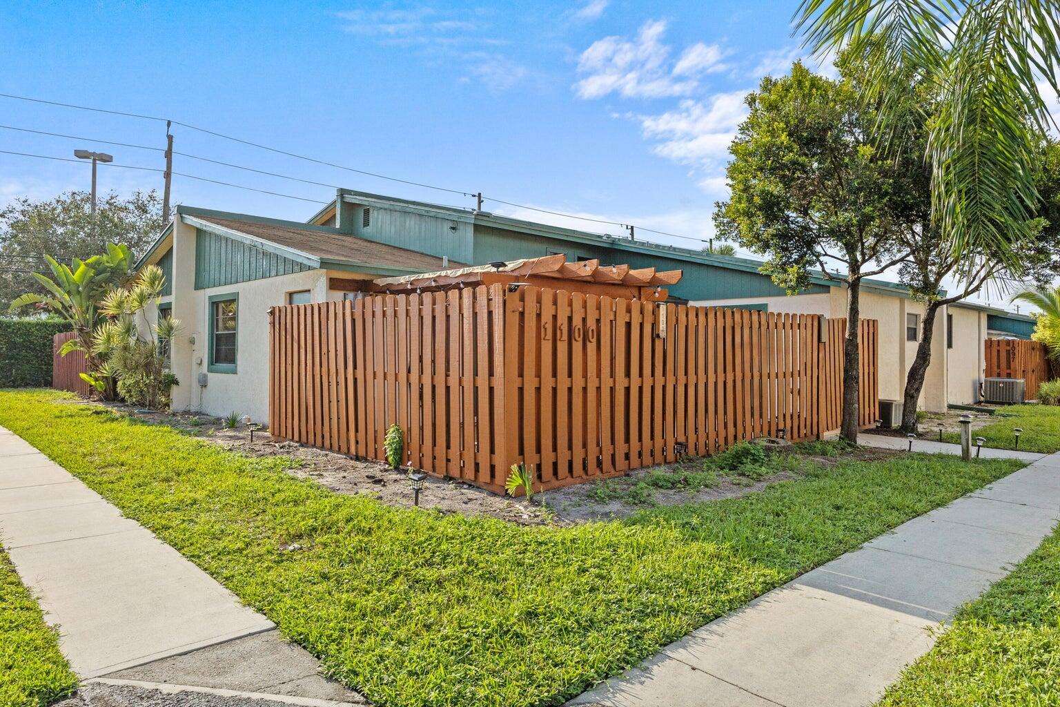Bright and spacious 2-bedroom, 2-bath townhome located in a very well-maintained community just 15 minutes from the beach. This gorgeous home features high vaulted ceilings at the entryway, a modern split bedroom floor plan, and beautiful tile & laminate flooring throughout. The renovated kitchen offers granite countertops, a sleek backsplash, stainless steel appliances, and a full-size washer and dryer. The master suite includes an en suite bathroom, a walk-in closet, and sliding glass doors leading to the private fenced-in patio with a covered area, perfect for relaxing or entertaining. Conveniently located just minutes from I-95, and surrounded by restaurants, shops, and grocery stores. Schedule your showing today!