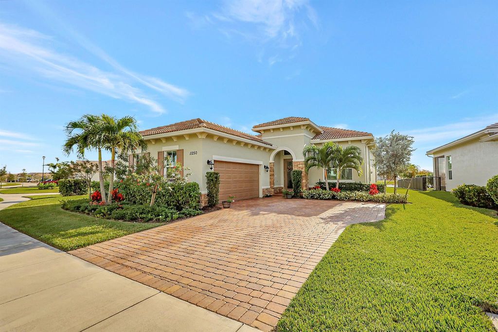 Photo of 11250 SW Lunata Way, Port Saint Lucie, FL 34987 (MLS # R10937664)