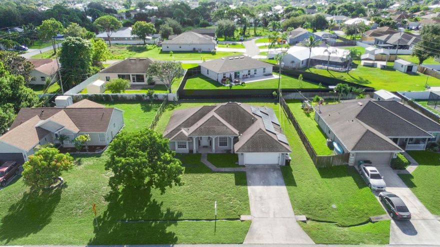 This beautifully designed home offers a formal living room and dining room, a comfortable family room, and an oversized master suite. Enjoy an island kitchen with stainless steel appliances, a spacious breakfast area, and a convenient utility room off the kitchen. Additional features include a 2-car garage and an exterior charging station, with a brand-new roof to be installed before closing. Ideally located near major hospitals, shopping, dining, I-95, and the Turnpike.