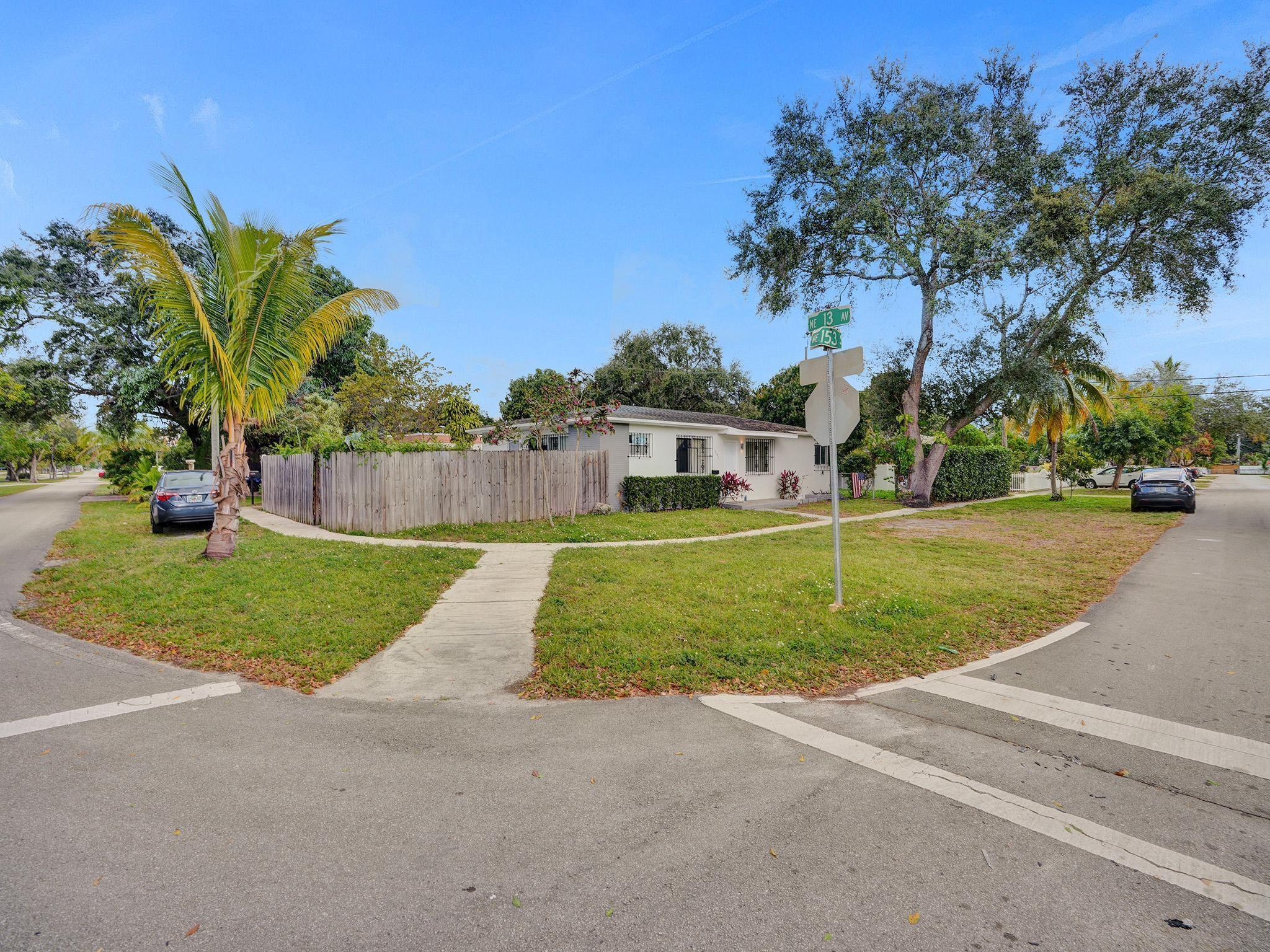 Discover this delightful corner property 2 bed, 1 bath gem with a spacious 6,000sqft lot and 1,100 sqft living area, ready for you to move right in! Tiled throughout, it features a large, fenced backyard - perfect for gatherings and room for a boat/RV. Prime location in the serene Oakgrove neighborhood, it’s minutes from beaches, Aventura Mall, Sunny Isles, and Biscayne Blvd. Easy Turnpike access and close to the airport. in front of the house is a beautiful walking path. Laundry included. No association approval needed. A true North Miami Beach treasure!