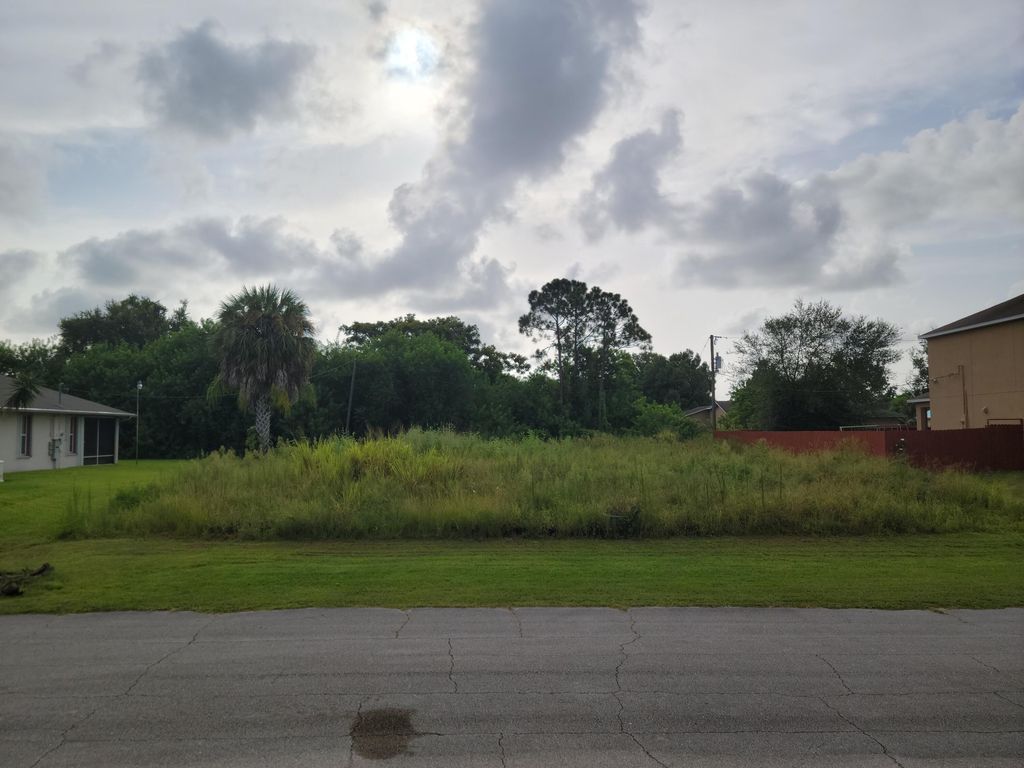 Photo of 411 SW Doreen Street, Port Saint Lucie, FL 34983 (MLS # R10823479)