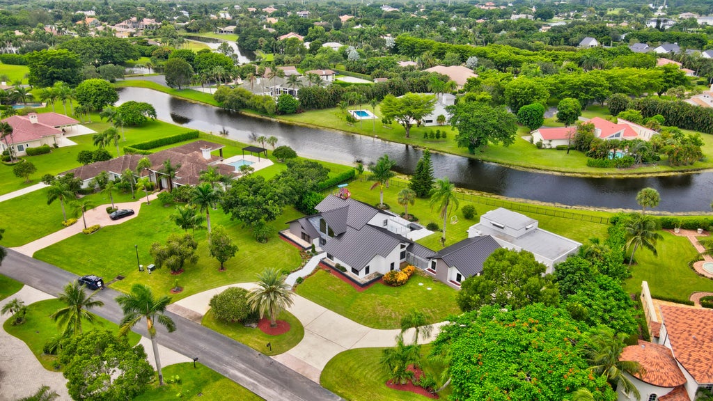 Photo of 10385 Avenida Del Rio, Delray Beach, FL 33446 (MLS # B26083116)