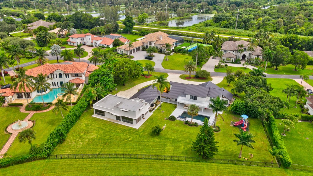 Photo of 10385 Avenida Del Rio, Delray Beach, FL 33446 (MLS # B26083116)