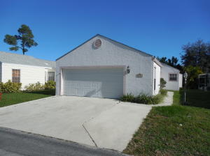 Freshly painted and carpeted single family home with a possible 4th bedroom and a large den/sitting room attached to the master bedroom
