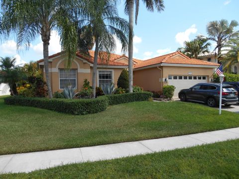 Photo of 22011 Palm Grass Drive, Boca Raton, FL 33428 (MLS # B26040934)