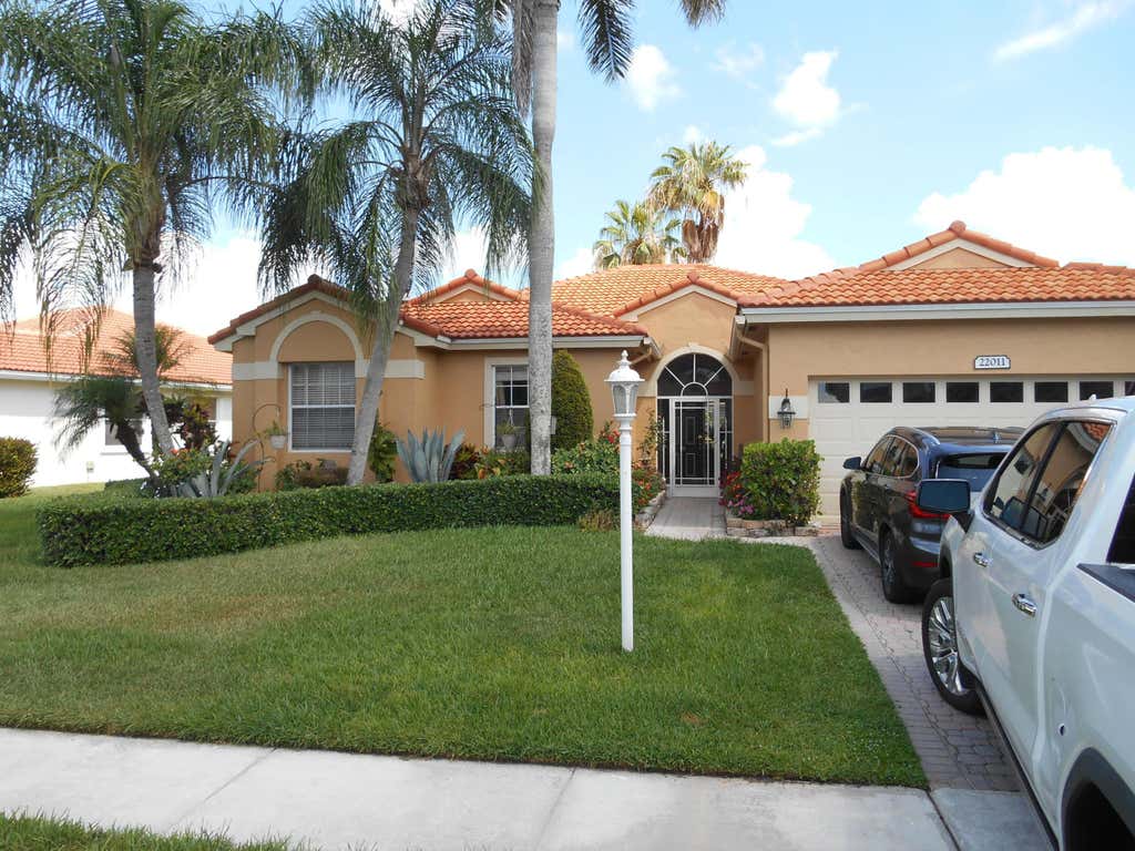 Photo of 22011 Palm Grass Drive, Boca Raton, FL 33428 (MLS # B26040934)