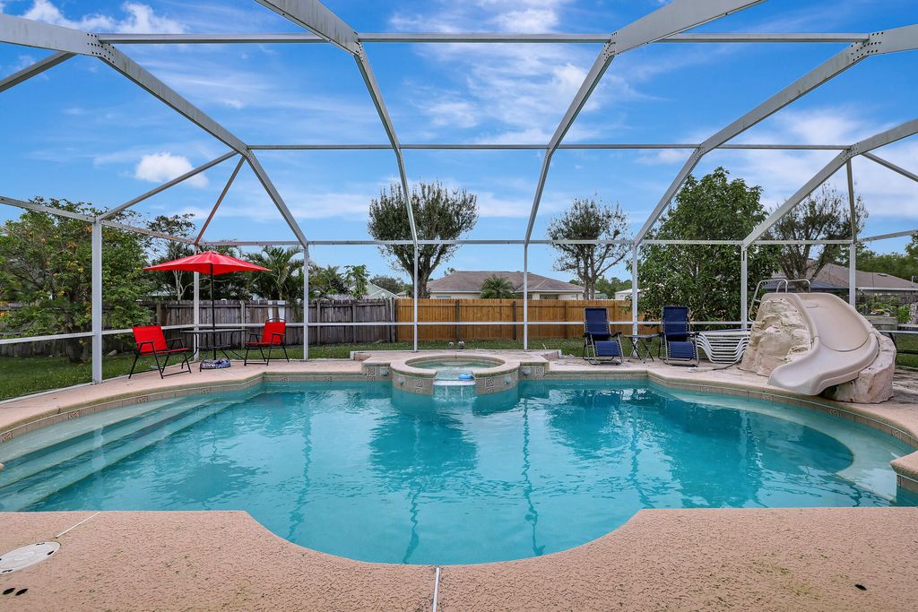 Photo of 5842 NW Gabo Court, Port Saint Lucie, FL 34986 (MLS # R10949313)