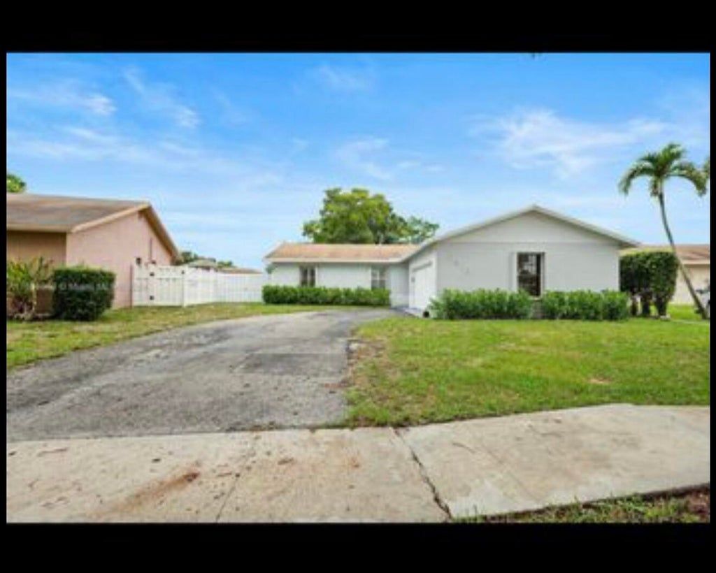 Photo of 2510 NW 110th Terrace, Sunrise, FL 33322 (MLS # B26060439)