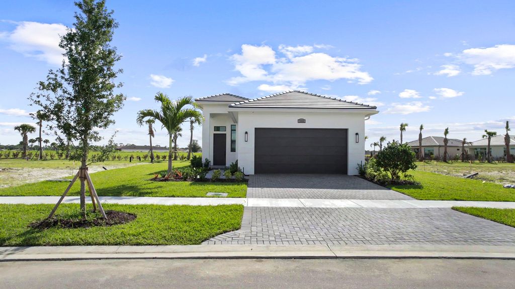 Photo of 7999 SW Andrea Way, Port Saint Lucie, FL 34987 (MLS # B26018444)