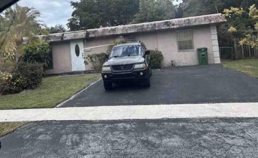 Photo of 7802 NW 69th Ter, Tamarac, FL 33321 (MLS # F10538501)