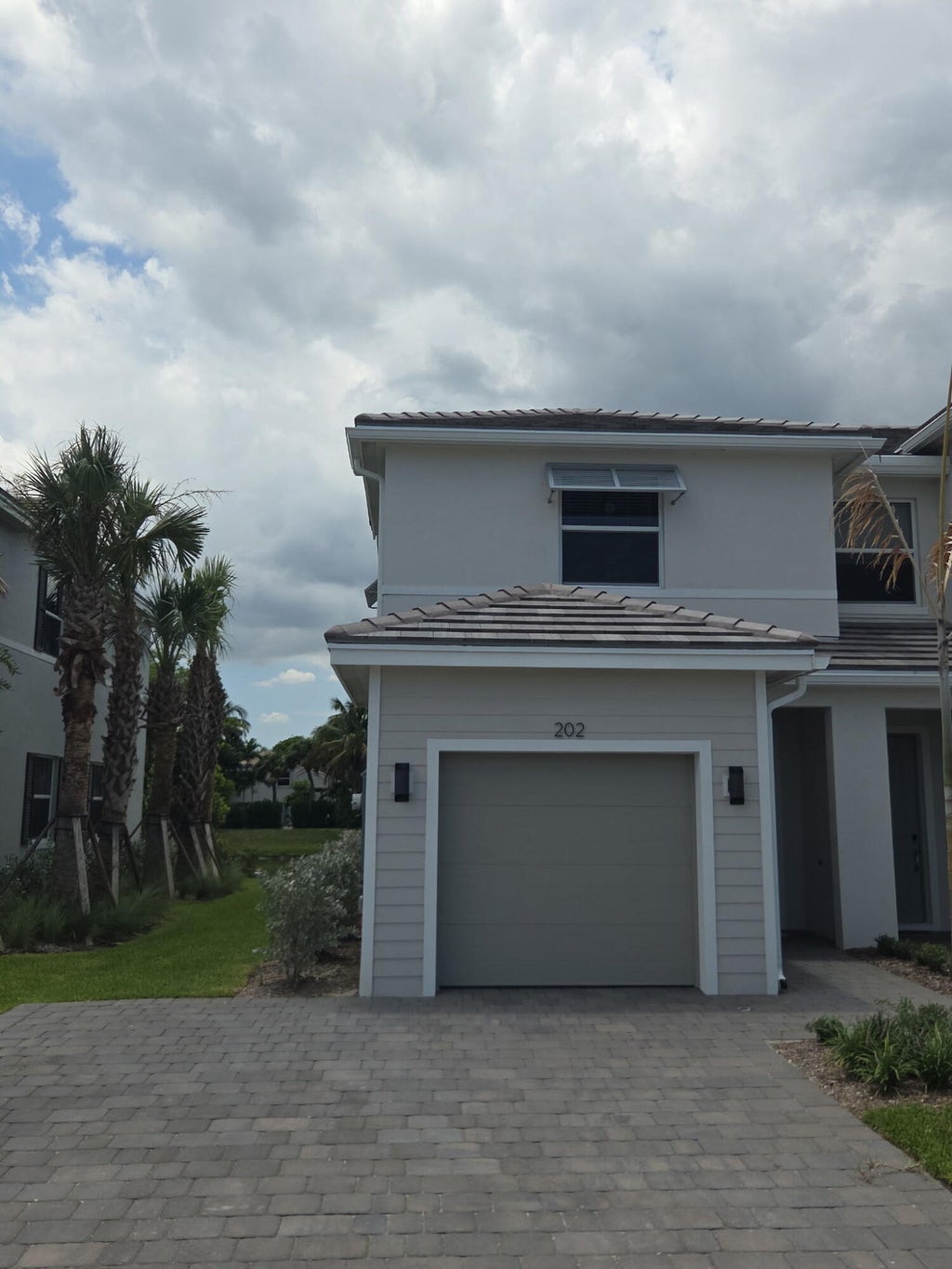 Photo of 202 Lakeside Landing Drive, Royal Palm Beach, FL 33411 (MLS # B26041035)