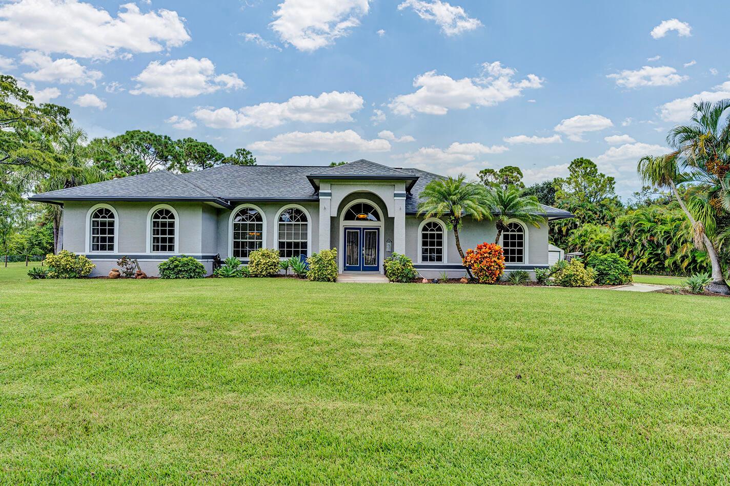 Welcome to your private retreat on 1.36 acres! This 4 bedroom, 2 bathroom, 2 car garage home offers the perfect blend of comfort and functionality. Featuring a 2020 roof, 2021 AC and the rare advantage of CITY WATER this property stands out from the rest. Enjoy your own heated private pool, plenty of outdoor space, and unique extras including a chicken coop and two storage sheds. With room to spread out and a home thats move in ready, this is a must see opportunity.