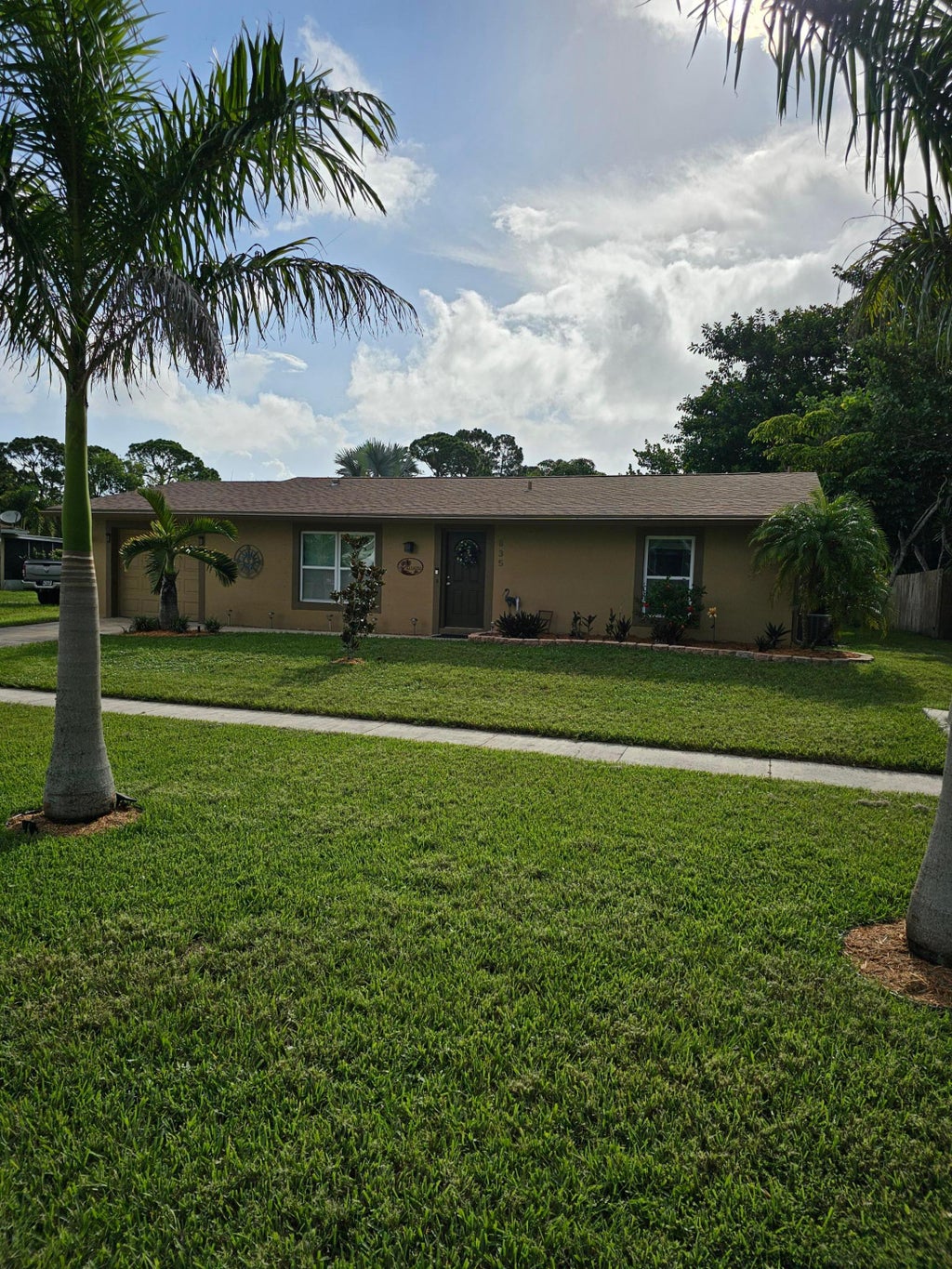 Photo of 835 SW Sandia Avenue, Port Saint Lucie, FL 34983 (MLS # R11009215)