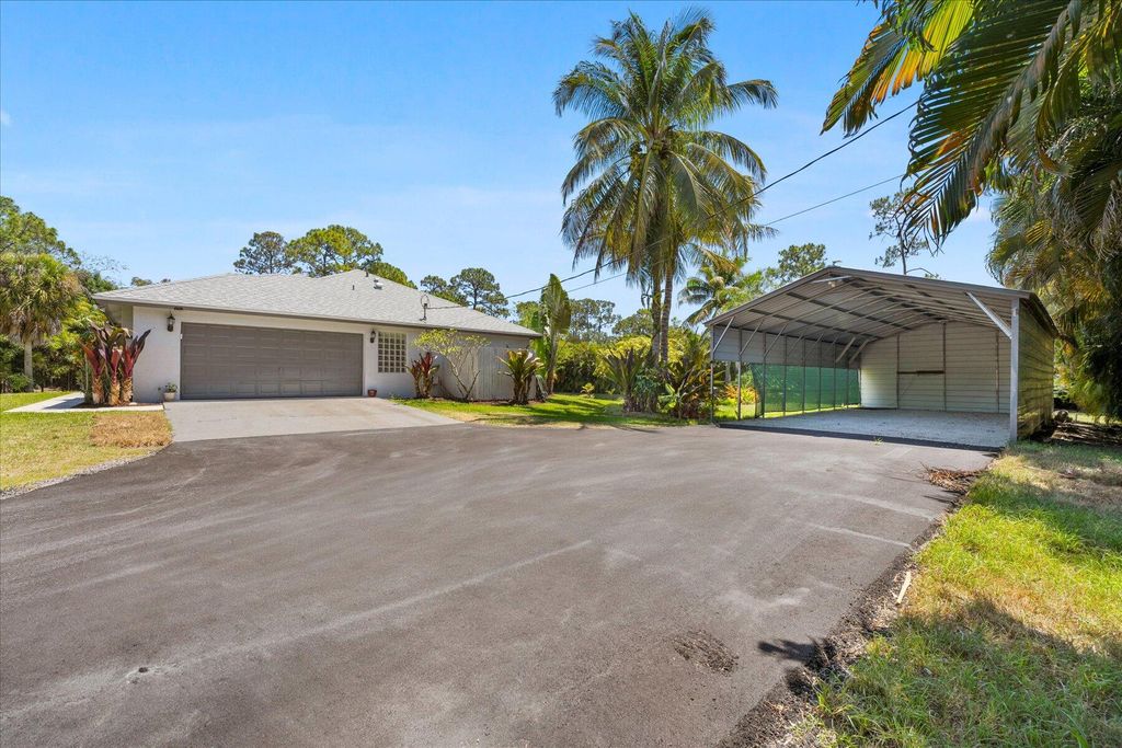 Photo of 18430 N 42nd Road, The Acreage, FL 33470 (MLS # R10978721)