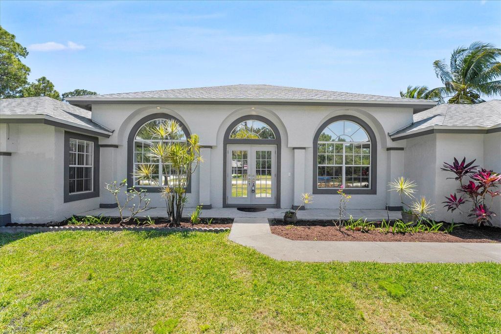 Photo of 18430 N 42nd Road, The Acreage, FL 33470 (MLS # R10978721)